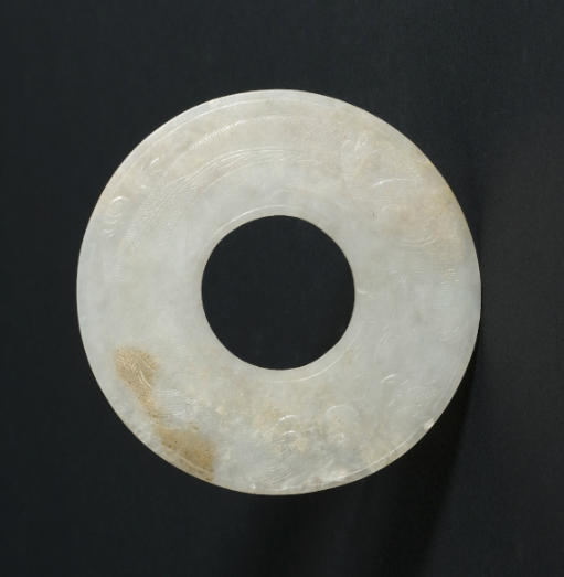  p>龙纹玉璧是唐代时期的一件文物,现收藏于上海博物馆. /p>