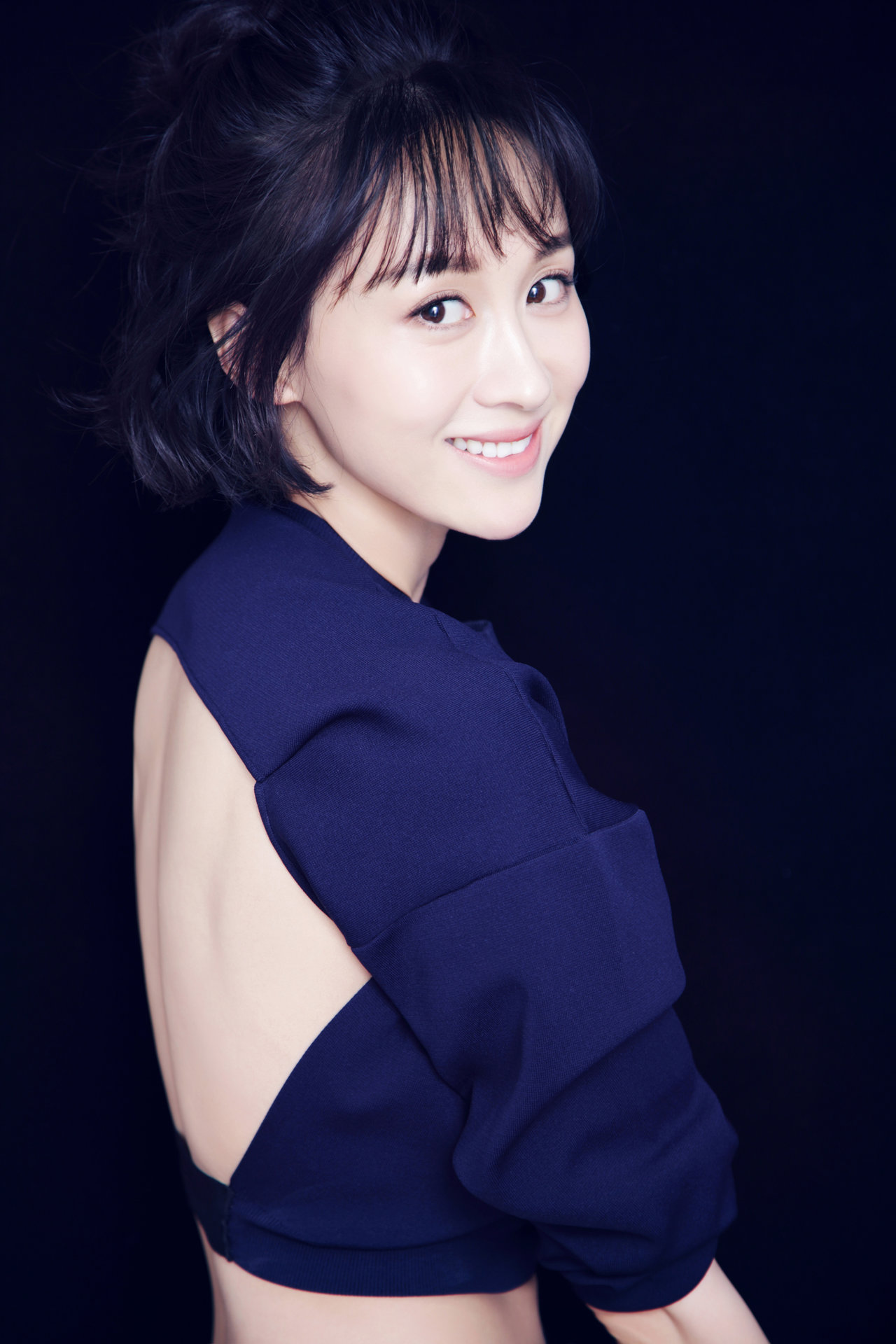 练束梅