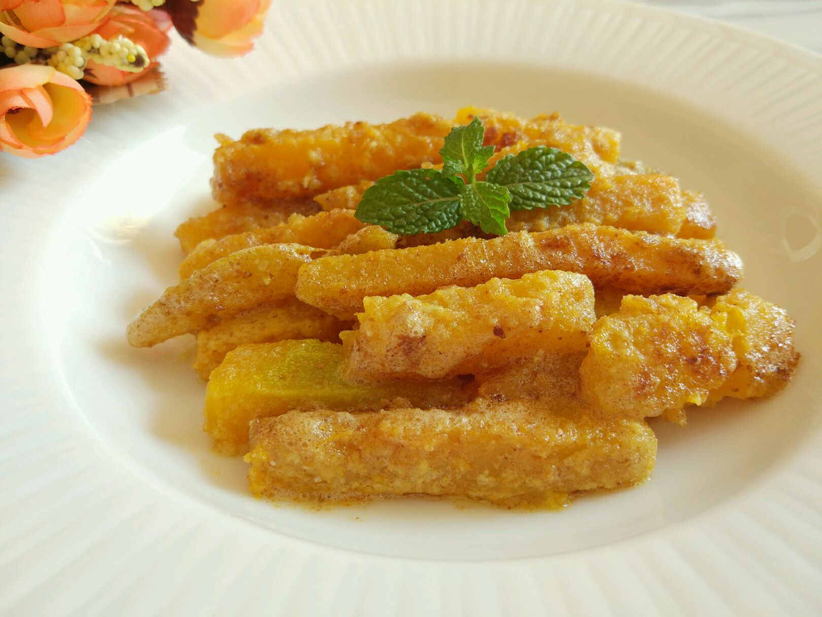  p>咸蛋黄南瓜是由咸鸭蛋,南瓜为主要食材做成的一道菜品,属于 a