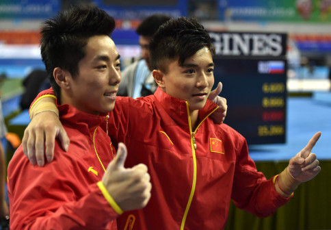 2014年世锦赛吊环决赛 刘洋（右）与尤浩