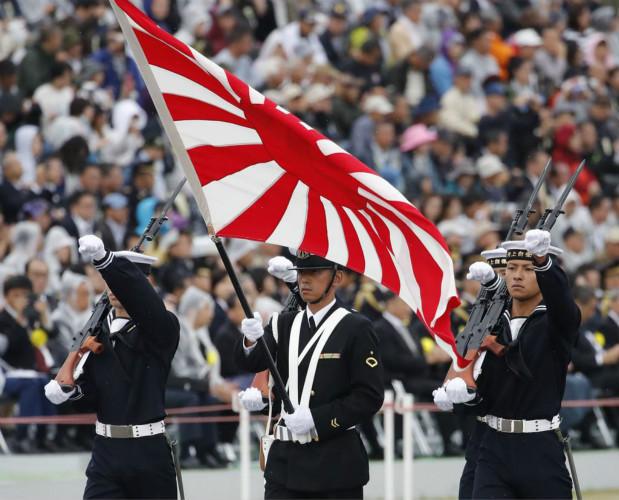  p>旭日旗,又称日本军旗,是带有红日和旭日光芒图案的一种旗帜,是原