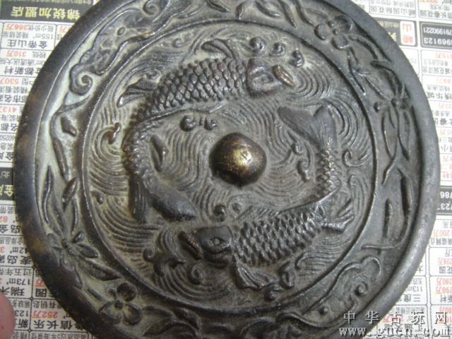 金代双鱼纹铜镜_百度百科