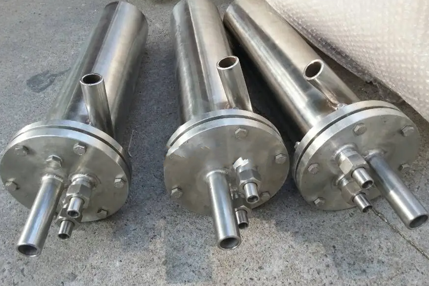 tube cooler ) 涡流冷却器又称涡旋管,涡流冷却管,涡流管(vortex tube