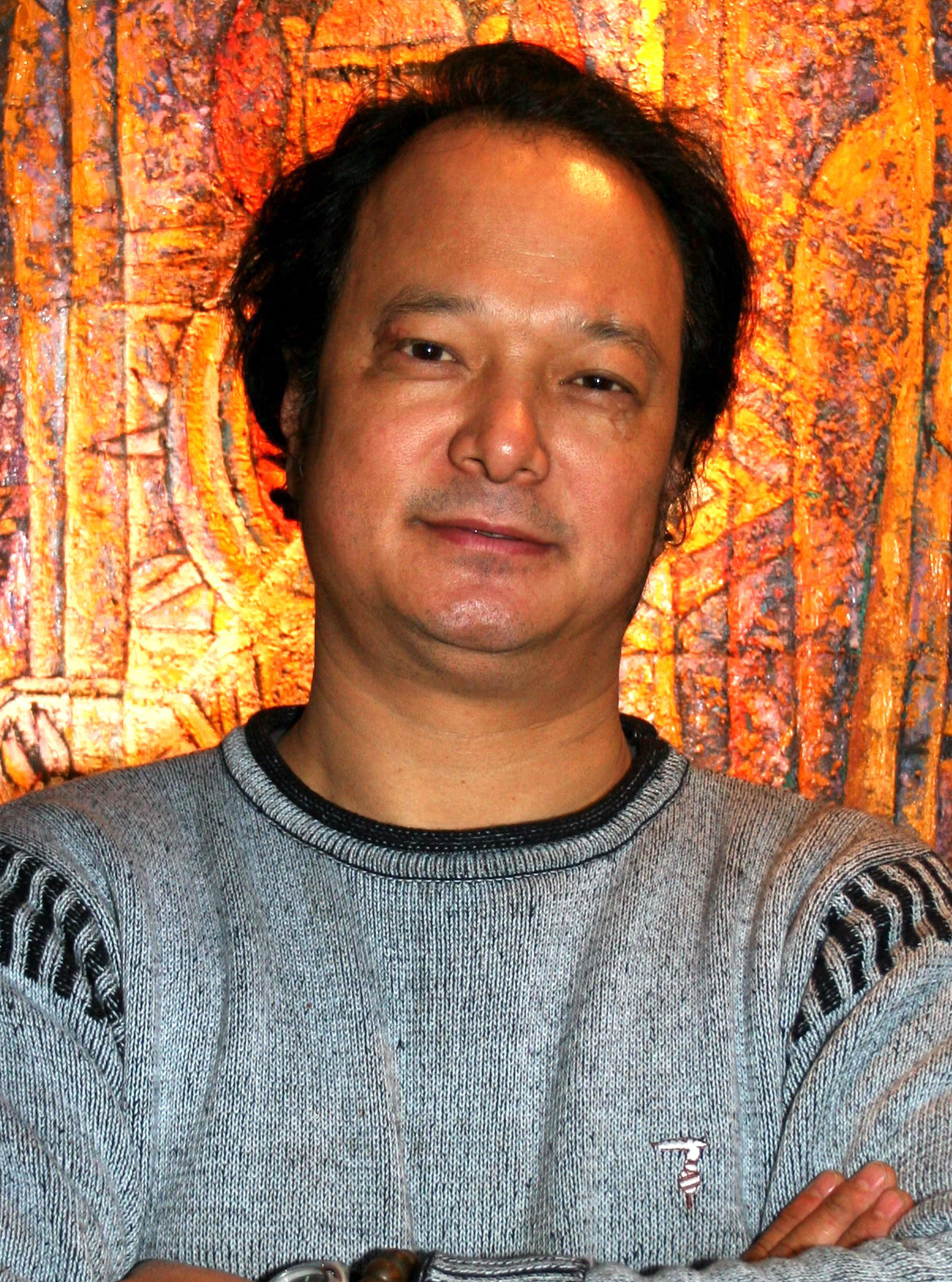  p>张春和,1958年出生于云南滇西玉龙山下, a ta