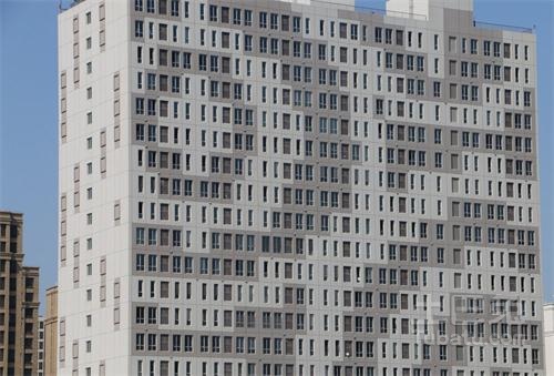 吐槽上海一座外观形似二维码的办公楼而来,用来形容类似的外观大楼