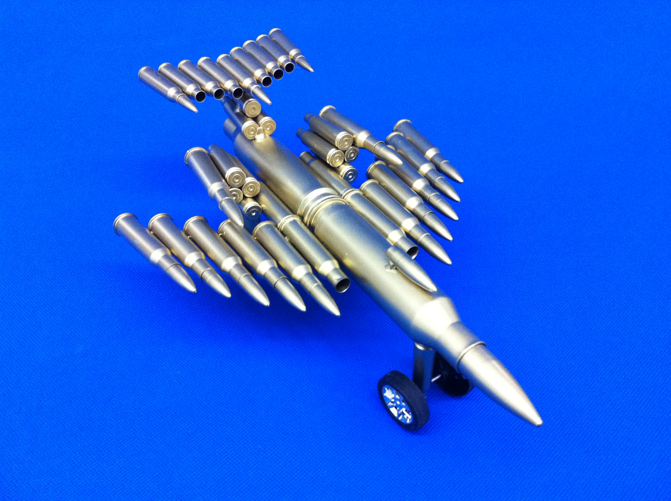  p>弹壳工艺品,又称子弹壳工艺品,弹壳模型.