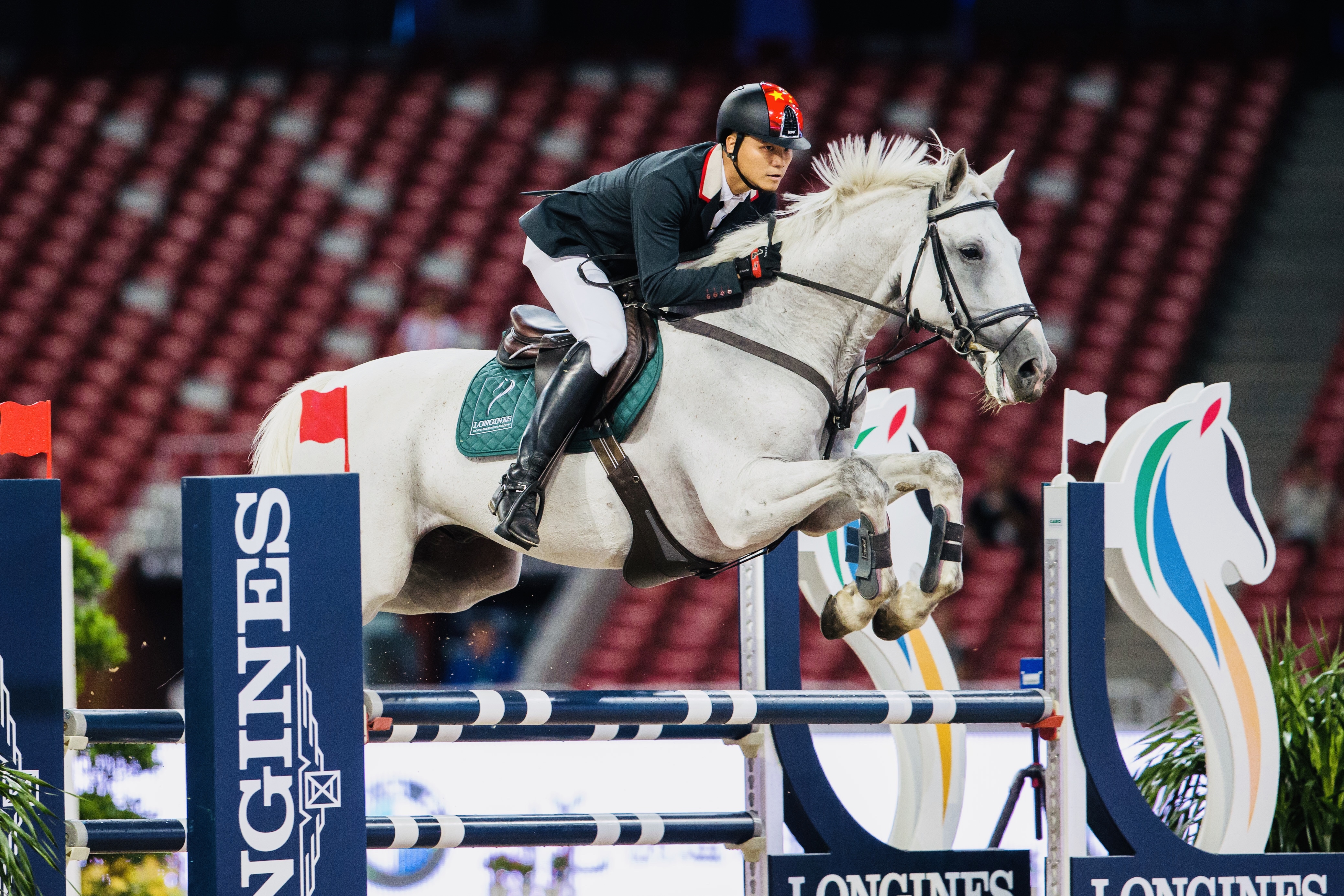 李静敏,汉族,广东人,中国马术运动员