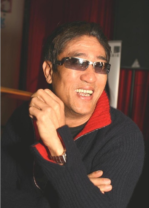 柯受良
