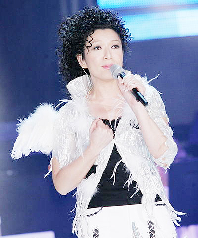  p>赵咏华,1967年5月19日出生于台湾,中国台湾女歌手,影视演员.