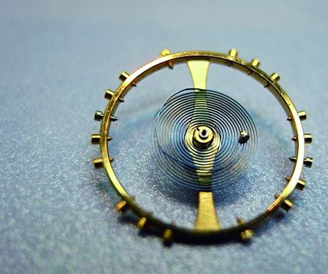  p data-id="gnatsk99wd">摆轮是一个机械零件的名称.