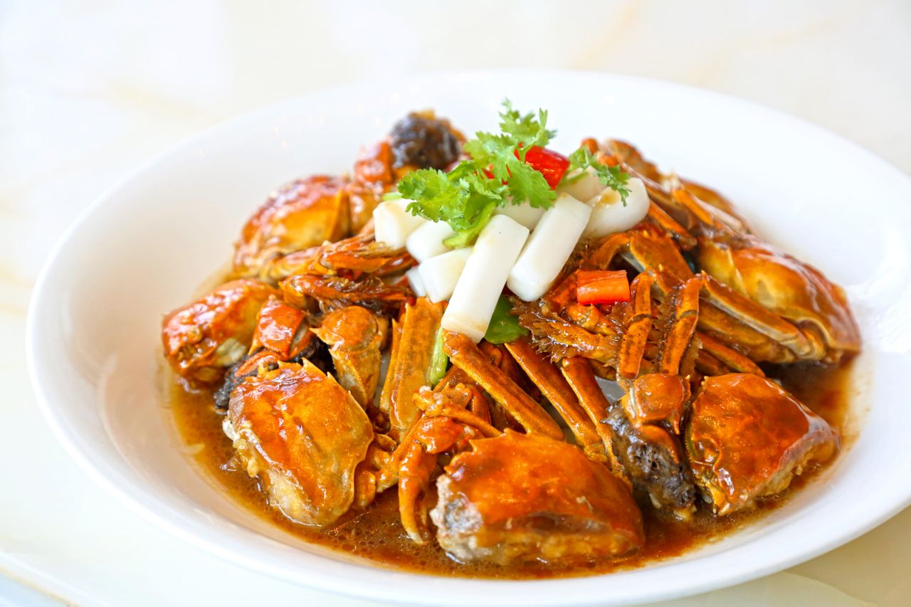  p>年糕炒蟹是一道美食,主要食材是河蟹,火锅年糕. /p>