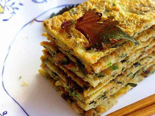  p>紫苏煎鸡蛋是以鸡蛋和紫苏叶为主要食材制成的一道美食. /p>