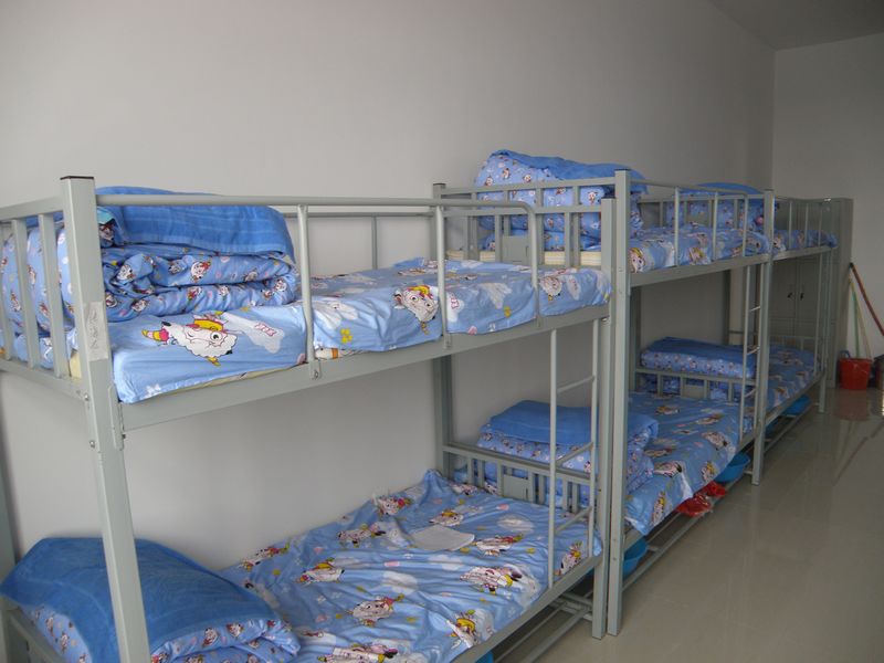  p data-id="gnwokfv8pj">寄宿制学校,分为全封闭型和半封闭型.