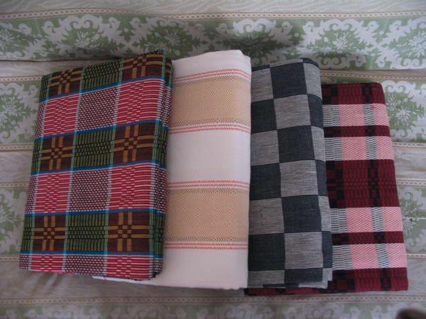 "等,因图案绚丽似锦,1985年被山东省工艺美术所定为此名,简称"鲁锦"