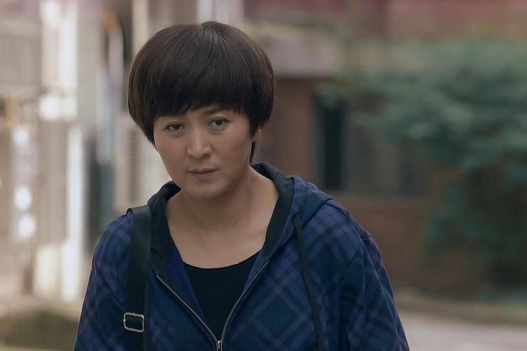  p data-id="gnbiqm8pub">唐亚莉,电视剧《回家的路有多远》中的女