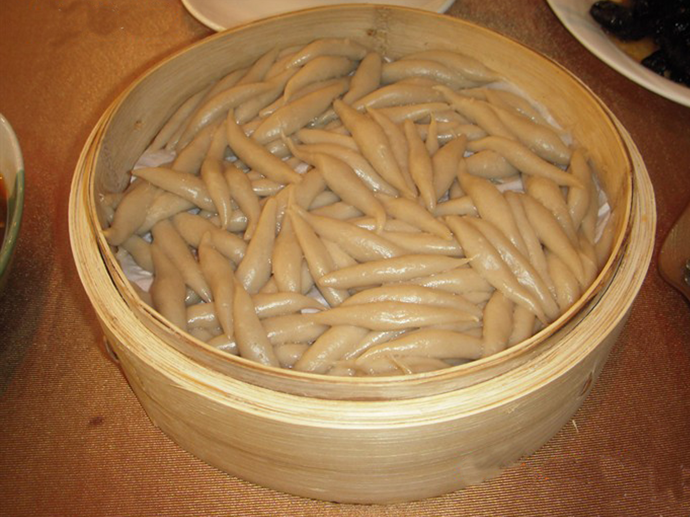  p>焖莜面鱼鱼是山西传统食品.