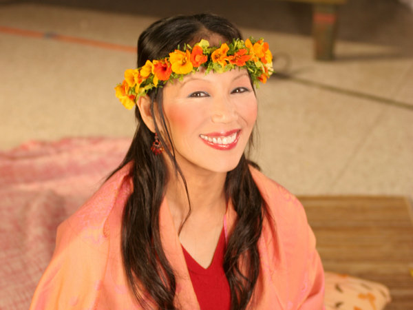 href="#" data-lemmaid="5066529">张蕙兰 /a>生长于香港,是将瑜伽