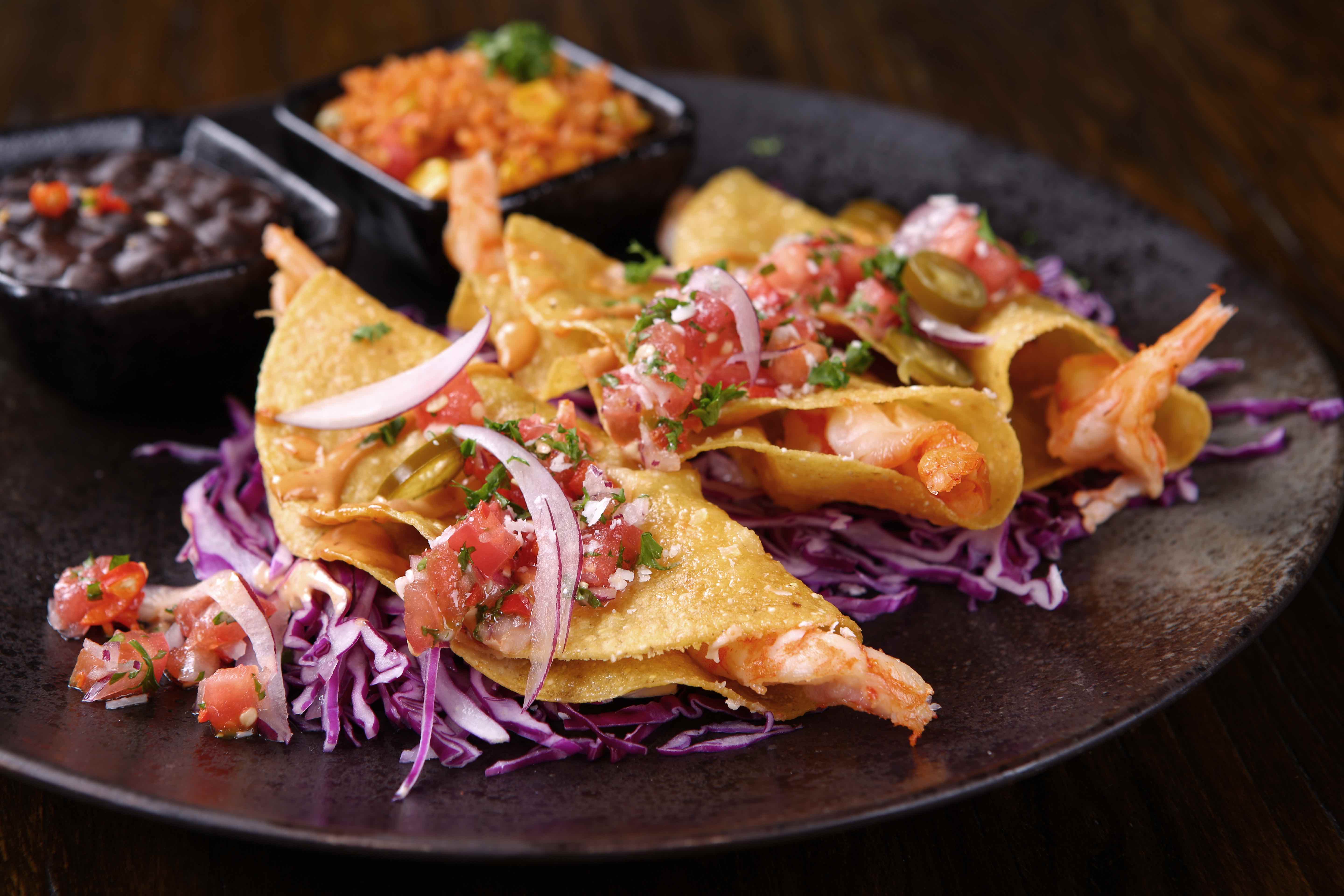  p data-id="sxf1w7xo6jre">鲜虾脆皮塔可是库迈墨西哥餐吧的一道推荐