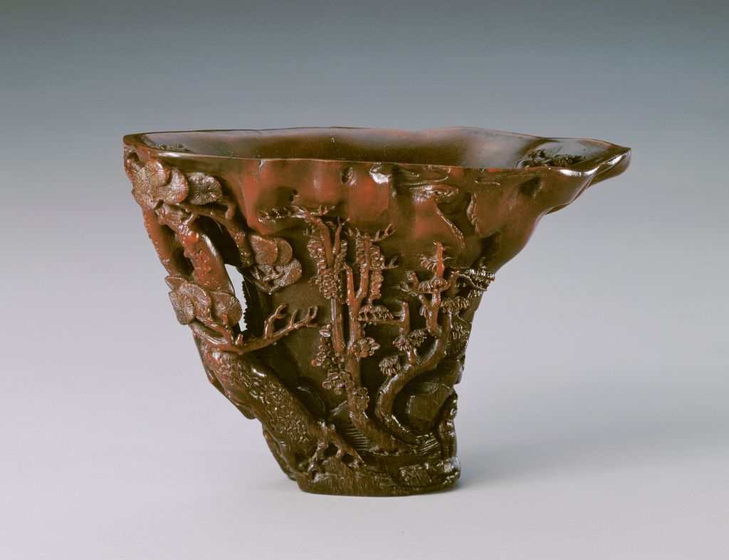  p>清犀角镂雕山水人物杯是清代的杯具. /p>