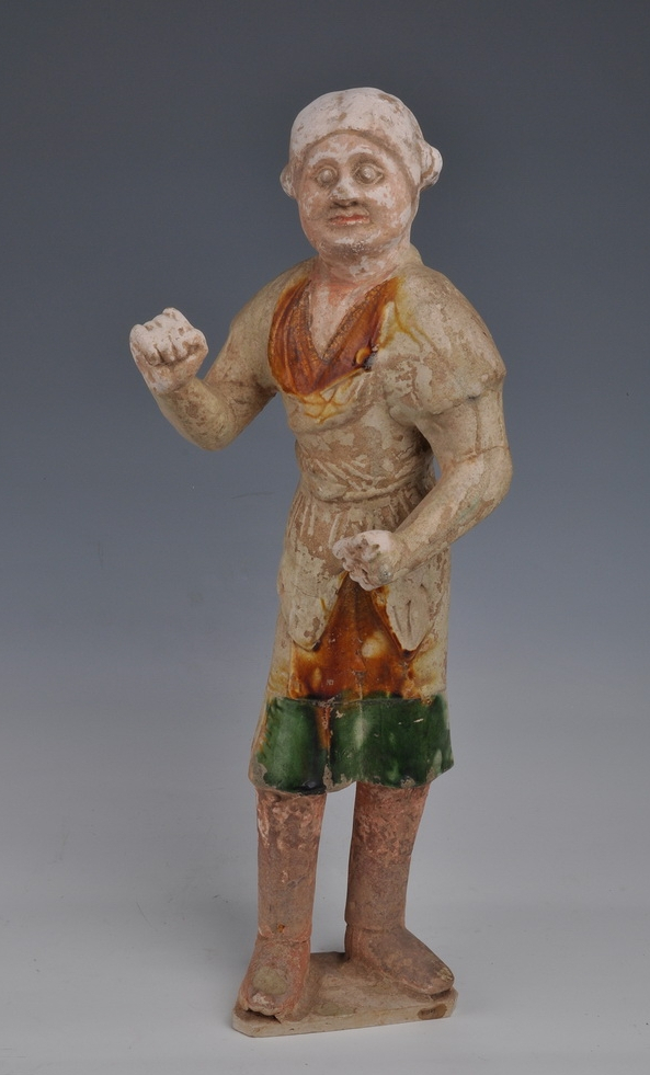 唐三彩胡服男立俑