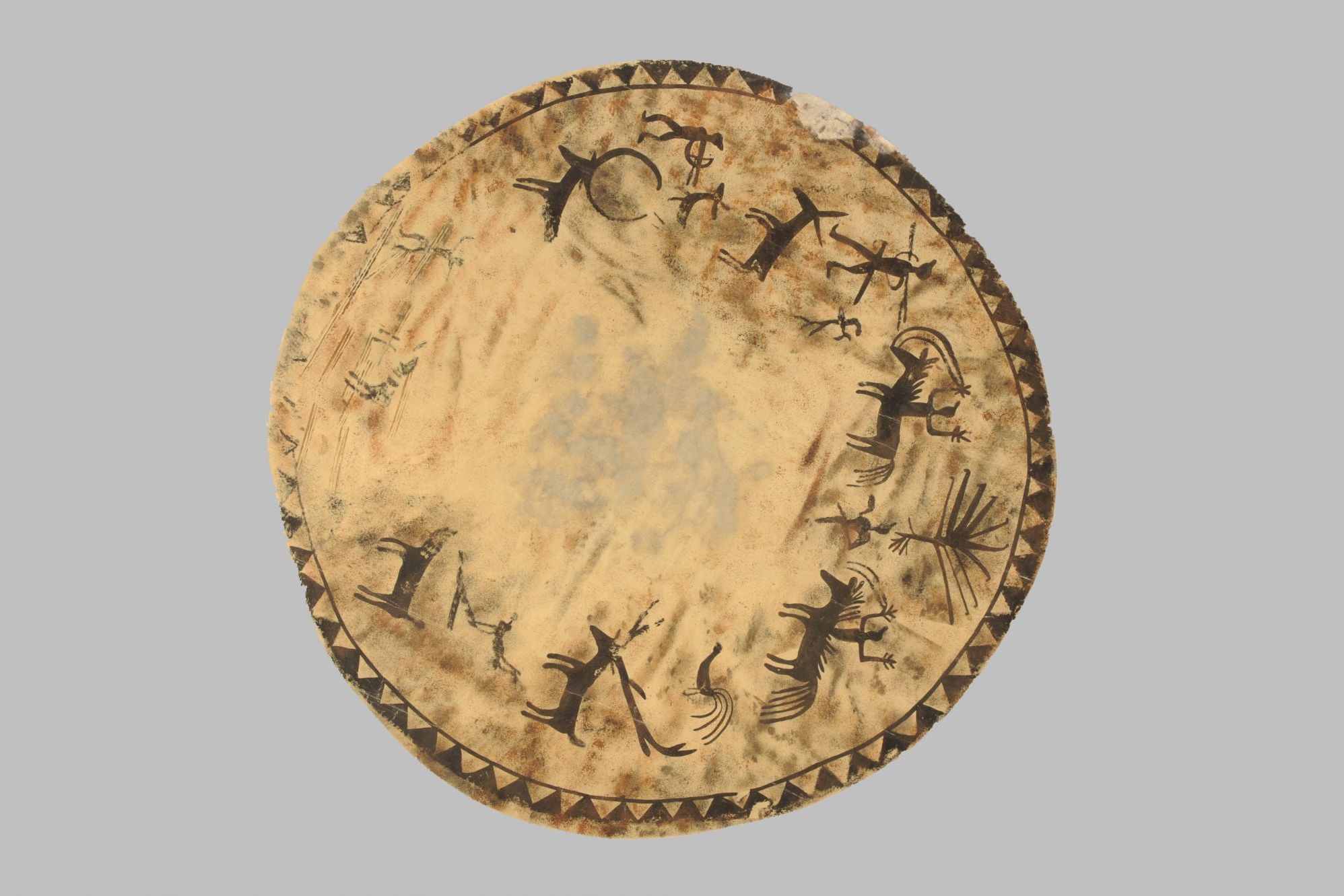 现代黎族独木牛皮鼓狩猎图鼓面拓片